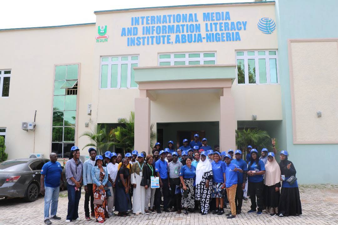 Group photo in front of the International Media and Information Literacy Institute headquarters at National Open University of Nigeria, Abuja